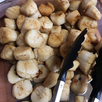 Billy's Seafood - a pile of peeled bananas and a knife - Seafood Markets Near Me - Kill Devil Hills, North Carolina Billy's Seafood - a pile of peeled bananas and a knife - Seafood Markets Near Me - Kill Devil Hills, North Carolina