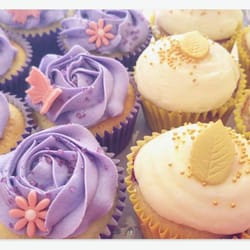 Alice in Cakeland - "Singing in the Purple rain" and the "I lemon you berry much"- a vanilla cupcake with raspberries baked inside & lemon cream cheese icing