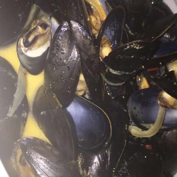 Pure Spirits - Delicious mussels cooked to perfection in a saffron cream sauce - Seafood Near Me - Toronto, Ontario Pure Spirits - Delicious mussels cooked to perfection in a saffron cream sauce - Seafood Near Me - Toronto, Ontario