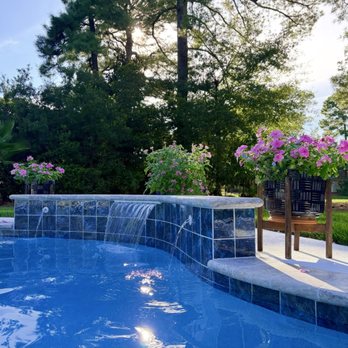 A-1 Pool Service - Expertly crafted sheer waterfall feature w spigots. - Pool Cleaners Near Me - Hilton Head Island, South Carolina A-1 Pool Service - Expertly crafted sheer waterfall feature w spigots. - Pool Cleaners Near Me - Hilton Head Island, South Carolina