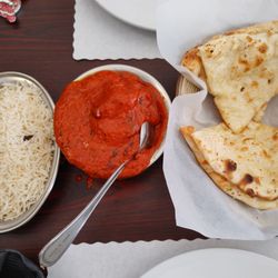 Kamana Indian Cuisine - Butter chicken with garlic naan