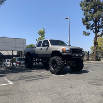 Signature Performance Tire Pros - 2003 GMC lifted 14 inches and signature helped fix the rear suspension done by another shop. - Tires Near Me - Costa Mesa, California Signature Performance Tire Pros - 2003 GMC lifted 14 inches and signature helped fix the rear suspension done by another shop. - Tires Near Me - Costa Mesa, California
