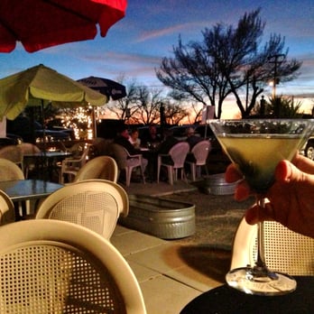 Esther’s Tex Mex - enjoying a Mexican martini on the patio at Super Slicks and watching the sunset - Tex-Mex Near Me - Buda, Texas Esther’s Tex Mex - enjoying a Mexican martini on the patio at Super Slicks and watching the sunset - Tex-Mex Near Me - Buda, Texas