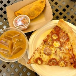 Adobo Empanada, Pepperoni Pizza, and Iced Coffee. Adobo Empanada, Pepperoni Pizza, and Iced Coffee.