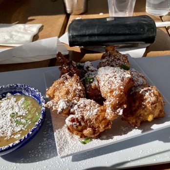 Joe's Farm Grill - Corn fritters with dipping sauce - American Near Me - Gilbert, Arizona Joe's Farm Grill - Corn fritters with dipping sauce - American Near Me - Gilbert, Arizona