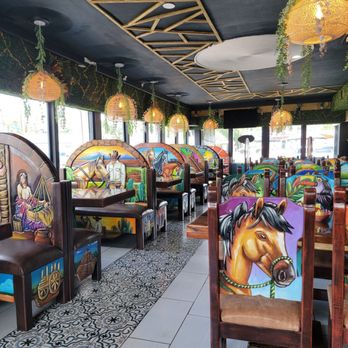 Clase Azul Bar & Grill - Wow, these are all carved and painted in Mexico - Tex-Mex Near Me - Dunedin, Florida