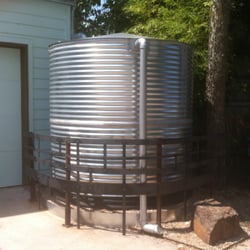 Texas Native Rainwater - 2,500 G Tank tucked in a South Austin alleyway.