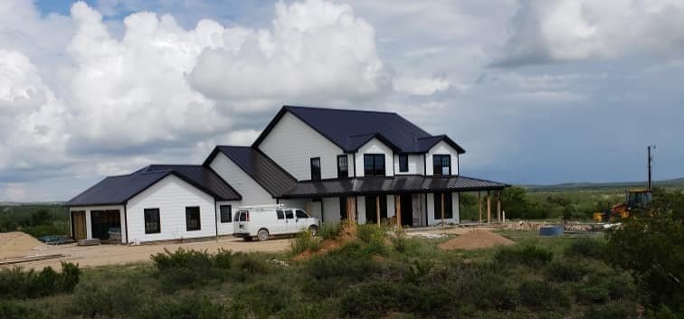 Slide of Candela Roofing