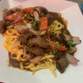 Mancora Peruvian Cuisine - Tallarines a la Huancaina con lomo saltado. - Peruvian Near Me - Alhambra, California Mancora Peruvian Cuisine - Tallarines a la Huancaina con lomo saltado. - Peruvian Near Me - Alhambra, California