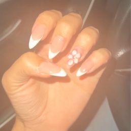 French tip with glitter, and a 3d flower out of acrylic