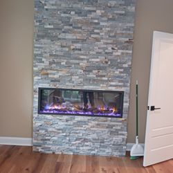 Best Custom Building - Wall tile addition with built in fishtank.