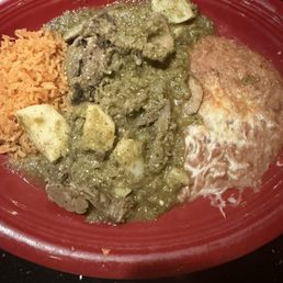 Lengua (tongue) en salsa verde with potatoes, rice and beans.