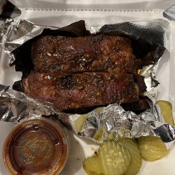 Smoked Lotus BBQ - 1/2 rack ribs with sweet hot pickles and bbq sauce - Barbeque Near Me - Hazel Park, Michigan Smoked Lotus BBQ - 1/2 rack ribs with sweet hot pickles and bbq sauce - Barbeque Near Me - Hazel Park, Michigan