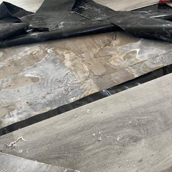 EZ Floors - The cement is uneven so the vinyl broke and we have to replace it - Flooring Near Me - Katy, Texas EZ Floors - The cement is uneven so the vinyl broke and we have to replace it - Flooring Near Me - Katy, Texas