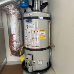 Burtech Plumbing - AFTER: New water heater installed with code upgrades.
Water heater installation done by a licensed plumber.