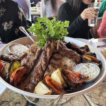 Panini Kabob Grill - This was the koobideh beef family style that came with an immense amount of rice, grilled vegetables, and sides of tzatziki. - Mediterranean Near Me - Pasadena, California Panini Kabob Grill - This was the koobideh beef family style that came with an immense amount of rice, grilled vegetables, and sides of tzatziki. - Mediterranean Near Me - Pasadena, California
