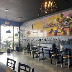Udom Thai - Decor. Could use a little upgrade. At least glue their poster edges back up.