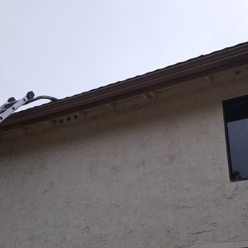 Four Seasons Rain Gutters - Getting up to the second story. - Gutter Services Near Me Four Seasons Rain Gutters - Getting up to the second story. - Gutter Services Near Me