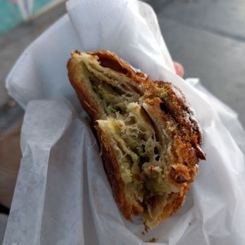Mamie Clafoutis - Half eaten pistachio crissoint - Coffee & Tea Near Me - Montreal, Quebec