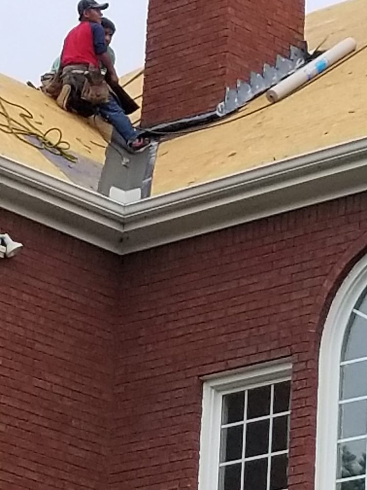 Slide of Top Edge Roofing and Construction