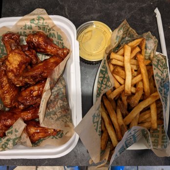 Wingstop - 10 piece bbq + honey mustard and fries with no seasoning - Chicken Wings Near Me - Seattle, Washington