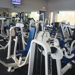 Powerhouse Gym Total Fitness Center - The machine area. You'll see this right as you walk in