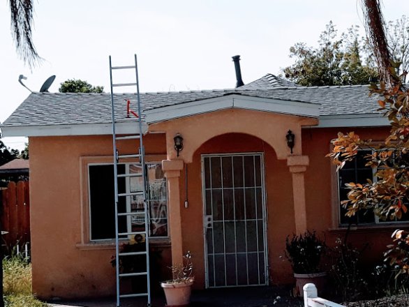 Slide of MRK Roofing Services