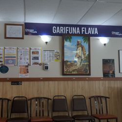 Garifuna Flava - Menu along wall and decor.