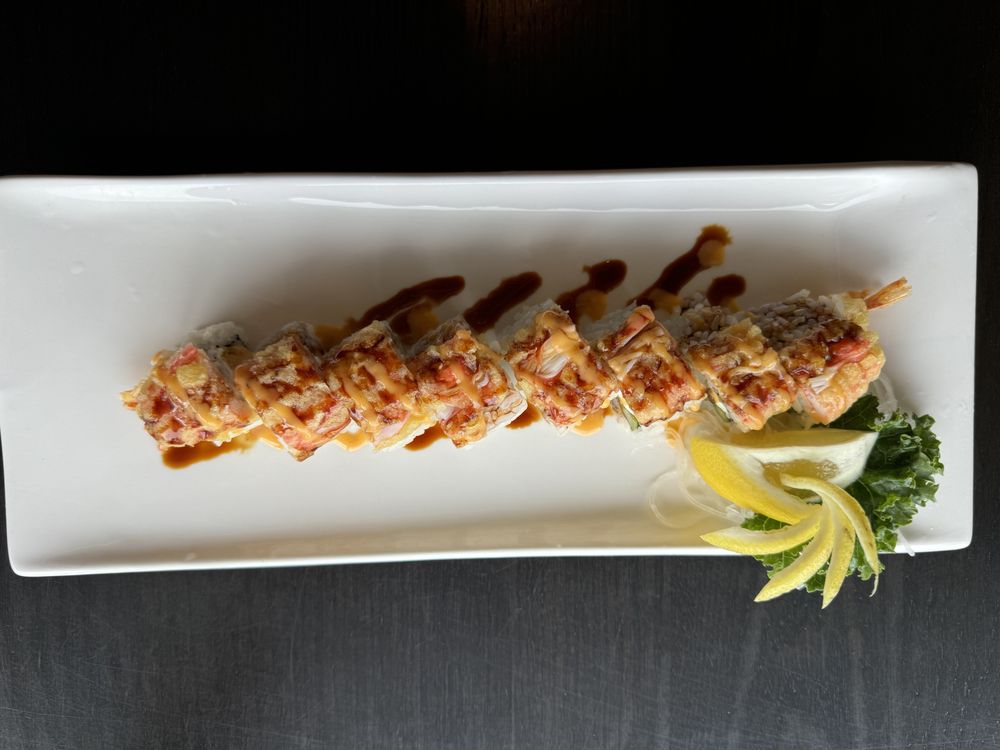 Nigori Sushi & Grill Logo