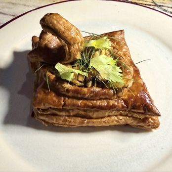 Vin Folk - Mussels tart! Try not to think of a Star Wars fighter jet. This crisp pastry with mussels was a great starter. A signature dish. - Restaurants Near Me - Hermosa Beach, California Vin Folk - Mussels tart! Try not to think of a Star Wars fighter jet. This crisp pastry with mussels was a great starter. A signature dish. - Restaurants Near Me - Hermosa Beach, California