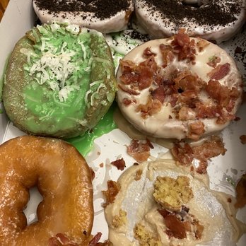 Duck Donuts - The bottom right donut tore getting it out the box (so the all the others). My nephew had to use a spoon to eat them. - Donuts Near Me - Virginia Beach, Virginia