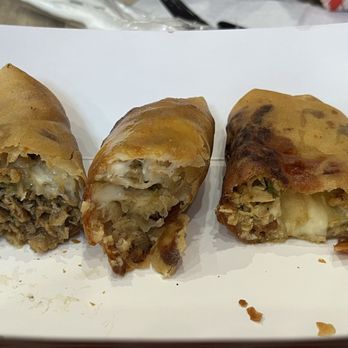 Rolled UP - From left to right - Philly cheesesteak, chicken parm, chicken cheesesteak - Cheesesteaks Near Me - Norfolk, Virginia Rolled UP - From left to right - Philly cheesesteak, chicken parm, chicken cheesesteak - Cheesesteaks Near Me - Norfolk, Virginia