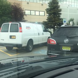 Northern Office Supply - Employee left van after I told her I needed the spot.