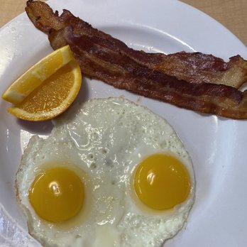 Jeb's Blueberry Hill - comes with the strawberry waffle combo (sunnyside eggs with 2 bacons) - Breakfast & Brunch Near Me - Clovis, California Jeb's Blueberry Hill - comes with the strawberry waffle combo (sunnyside eggs with 2 bacons) - Breakfast & Brunch Near Me - Clovis, California