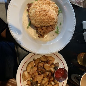 Rhett - Crispy chicken biscuit and breakfast potatoes - Breakfast & Brunch Near Me - Savannah, Georgia Rhett - Crispy chicken biscuit and breakfast potatoes - Breakfast & Brunch Near Me - Savannah, Georgia