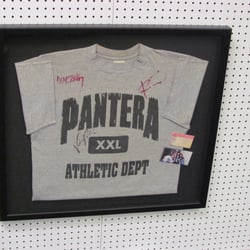 Bird's Custom Framing & Art Supplies - Concert T-Shirt & ticket stubs.