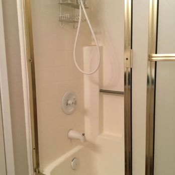 Bathroom Surface Solutions - Old shower door enclosure - Refinishing Services Near Me