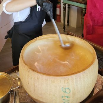 Villa Parmigiano - Firing the wheel of Parmigiano - Italian Near Me - Las Piñas, NCR