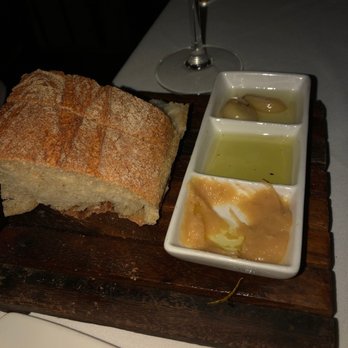 Carmelina's - Ciabatta with 1. White bean purée, 2. EVOO, 3. Roasted garlic cloves - Italian Near Me - Boston, Massachusetts