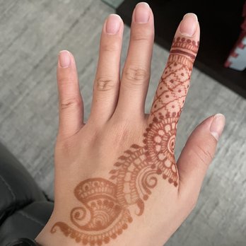 Hiral Henna - 14 hours later... Unfortunately, didn't follow the aftercare steps thoroughly, but it still looks amazing!!! - Henna Artists Near Me - San jose, California