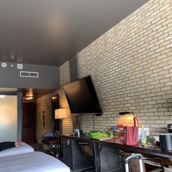 Ironworks Hotel Indianapolis - Rustic brick wall, huge tv. - Hotels Near Me - Indianapolis, Indiana Ironworks Hotel Indianapolis - Rustic brick wall, huge tv. - Hotels Near Me - Indianapolis, Indiana