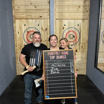 Crazy Axe - Get your name on the high score board! - Axe Throwing Near Me - Raleigh, North Carolina Crazy Axe - Get your name on the high score board! - Axe Throwing Near Me - Raleigh, North Carolina