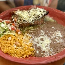 Guadalajara - Green Chili Chimichanga with pork carnitas and chilis filling. Smothered in pork green chili and cheese. Sadly burnt.