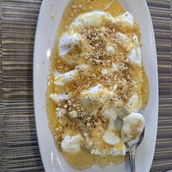 Nostalgia Greek Taverna - Greek yogurt with honey and walnuts. Delicious - Greek Near Me - Stuart, Florida Nostalgia Greek Taverna - Greek yogurt with honey and walnuts. Delicious - Greek Near Me - Stuart, Florida