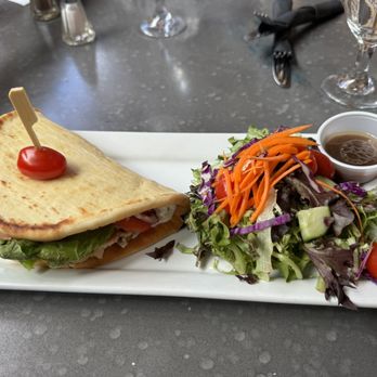 Vimy's Lounge & Grill - Chicken pita, Greek style with feta and tzatziki, and comes with very fresh salad. Much bigger than photo looks! - Lounges Near Me - Waterton Park, Alberta Vimy's Lounge & Grill - Chicken pita, Greek style with feta and tzatziki, and comes with very fresh salad. Much bigger than photo looks! - Lounges Near Me - Waterton Park, Alberta