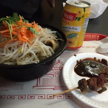 Gene's Chinese Flatbread Cafe - Cumin lamb hand pulled noodles on the left, lamb skewer on the right. - Chinese Near Me - Boston, Massachusetts Gene's Chinese Flatbread Cafe - Cumin lamb hand pulled noodles on the left, lamb skewer on the right. - Chinese Near Me - Boston, Massachusetts