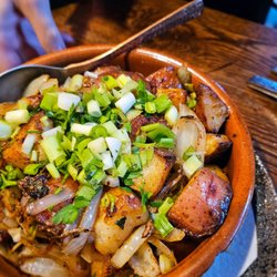 Kartveli - Pork Ojakhuri- Pork, potatoes, and grilled onions. $14.99. Also available "Sokos" style with mushrooms. Very good version