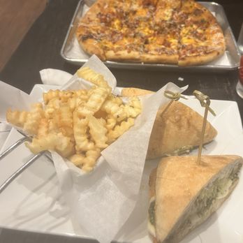 The Stillery - Grilled Chicken Tomato Pesto Hot Chicken Pie fries - New American Near Me - Nashville, Tennessee