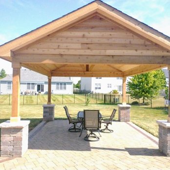 Arrowhead Brick Pavers - a patio with a table and chairs - General Contractors Near Me - Bristol, Illinois