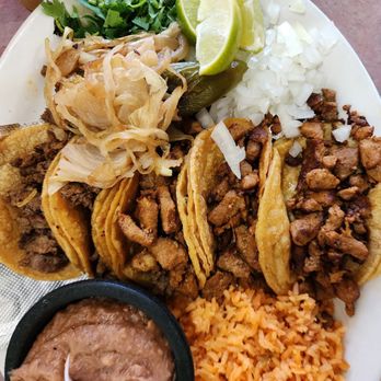Carlito’s Taco House - Close up of street tacos refried beans Spanish rice excellent portions excellent flavor - Tacos Near Me - San Antonio, Texas Carlito’s Taco House - Close up of street tacos refried beans Spanish rice excellent portions excellent flavor - Tacos Near Me - San Antonio, Texas